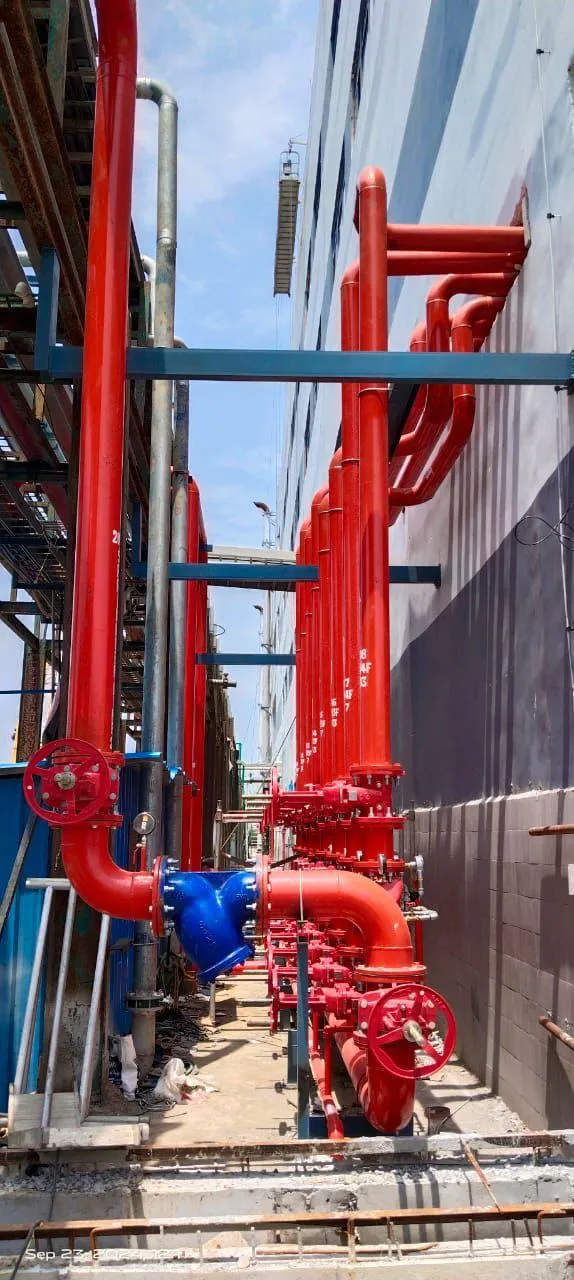 External riser manifold with butterfly valves between two Foxconn buildings