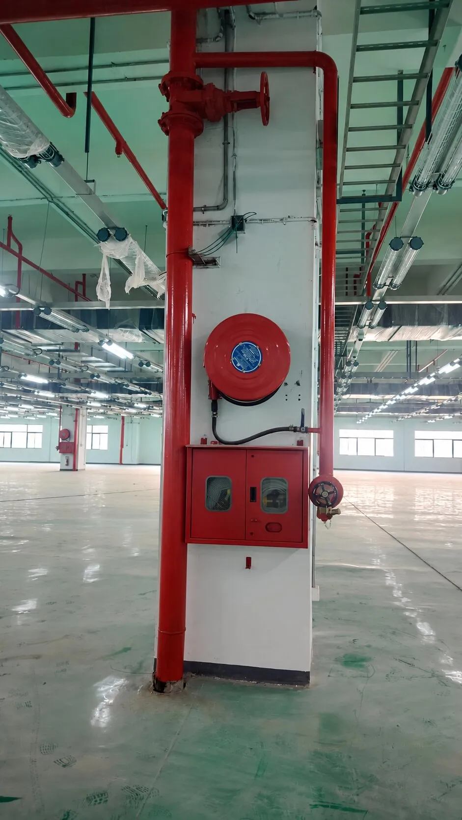 Landing valve, hose reel and hose cabinet on a Foxconn riser